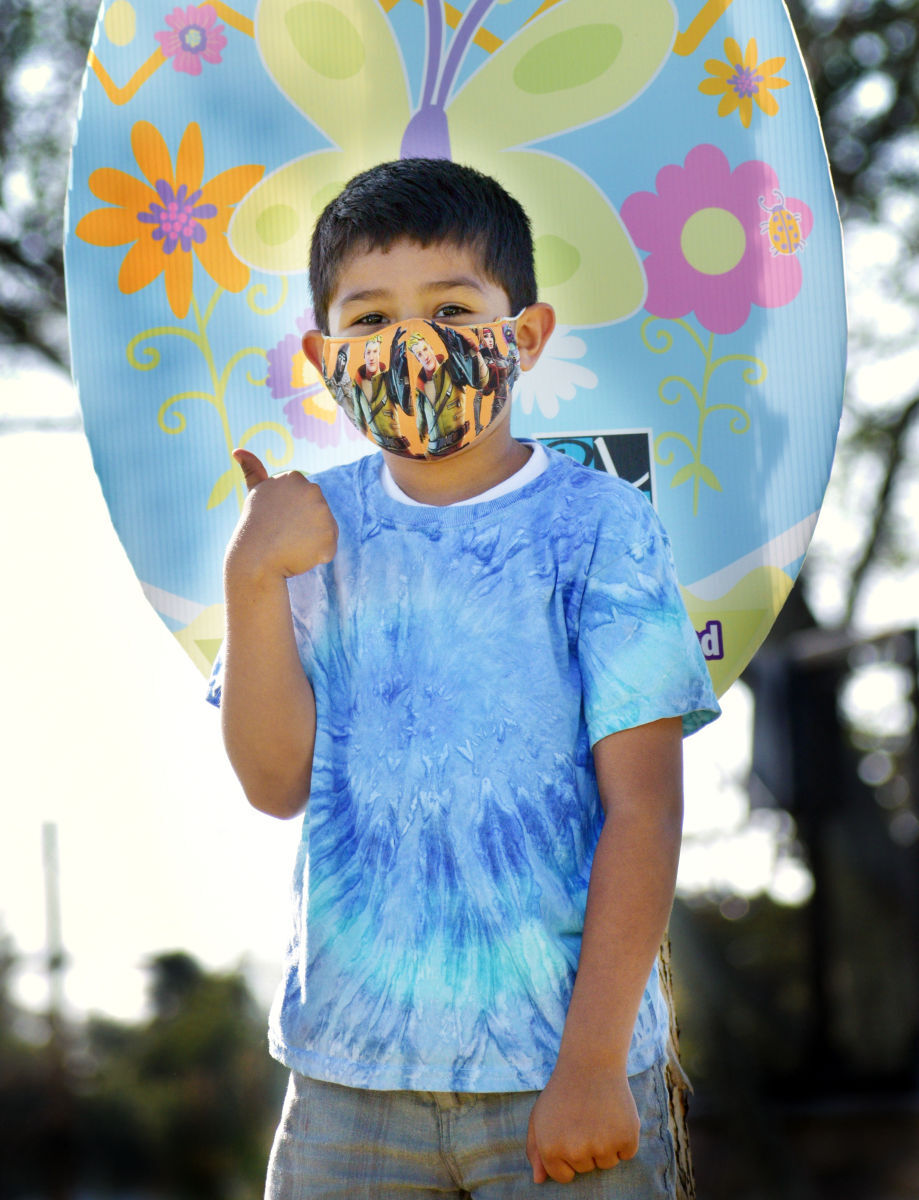 Daniel Barboza gives a thumbs up as he discovers the hidden egg in Preisker park friday afternoon.